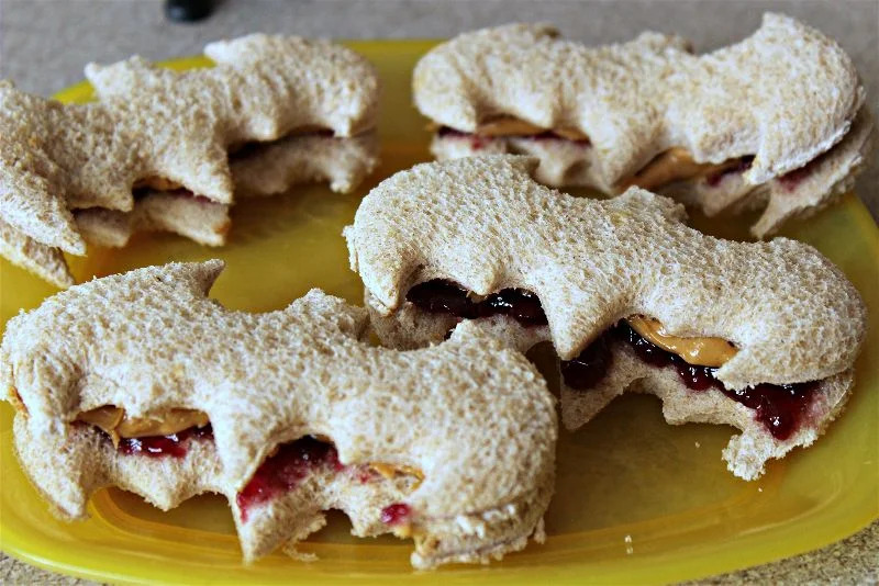Halloween party food on budget ideas Bat Peanut Butter and Jelly Sandwiches