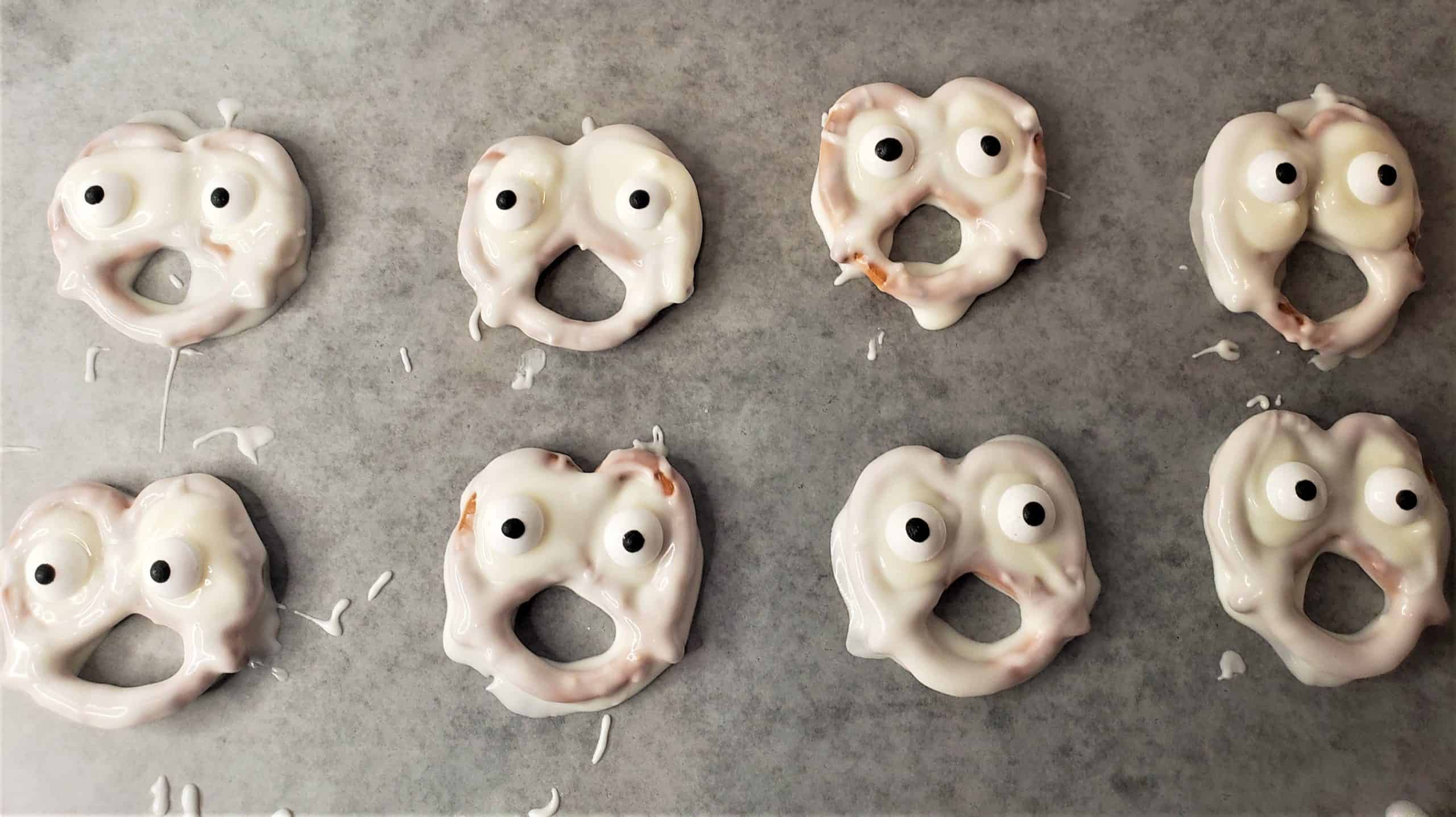 Halloween party food on budget ideas Chocolate-Dipped Ghost Pretzels